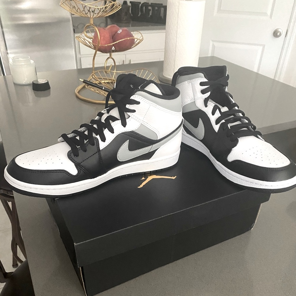 Air Jordan 1 mid. Black, white and gray.